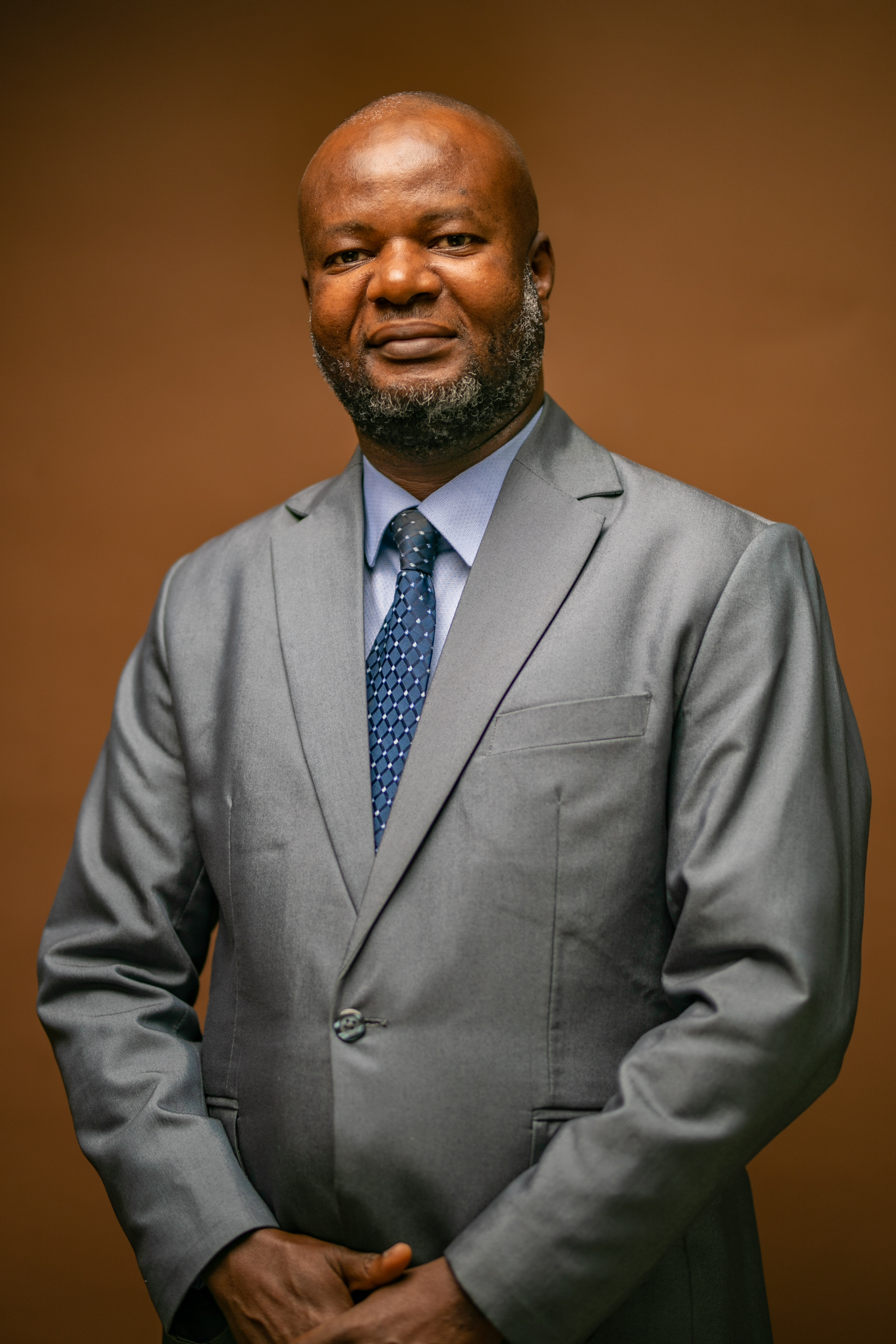 Dr. Isaac Manu